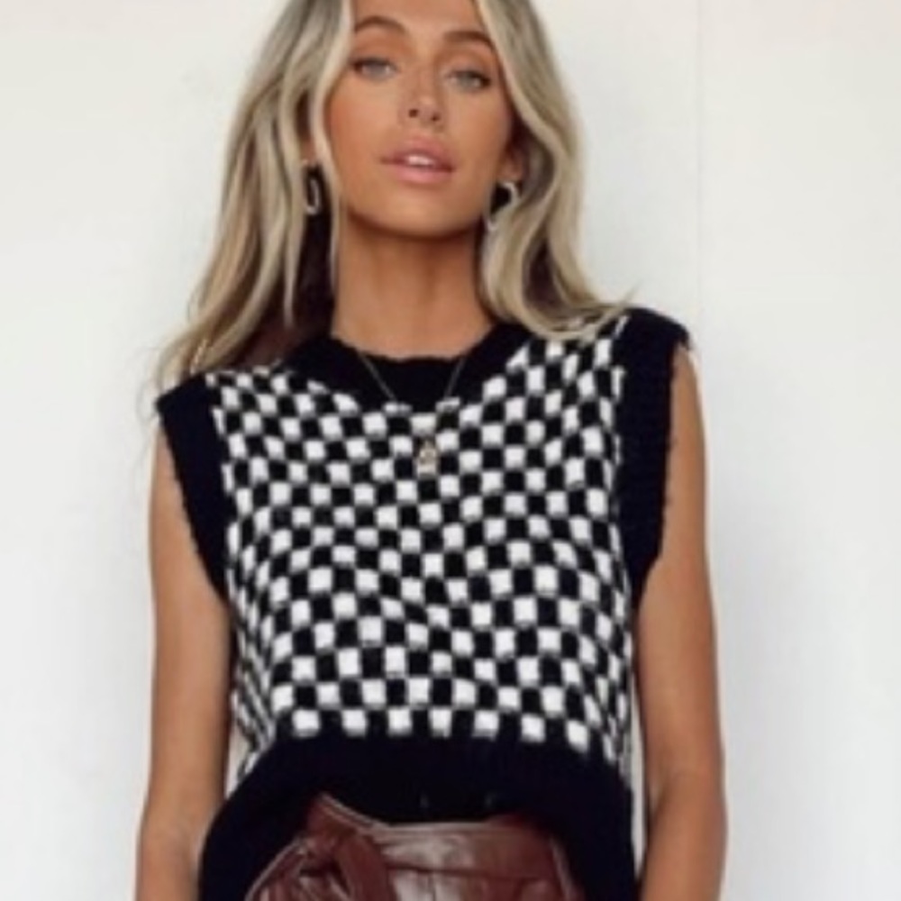 Vestique black and white checkered sweater vest